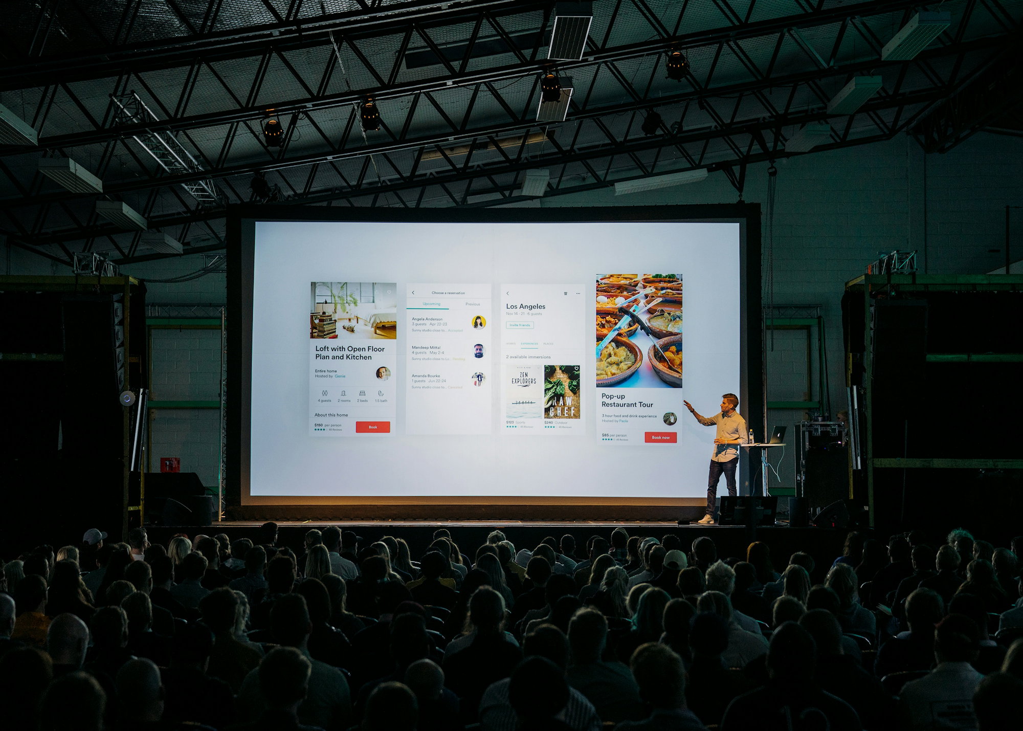person-discussing-while-standing-in-front-of-a-large-screen-in-front-of-people-inside-dim-lighted-room.jpg person discussing while standing in front of a large screen in front of people inside dim-lighted room